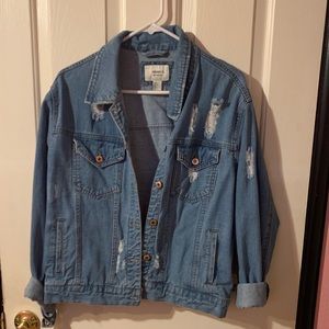 Distressed denim jacket